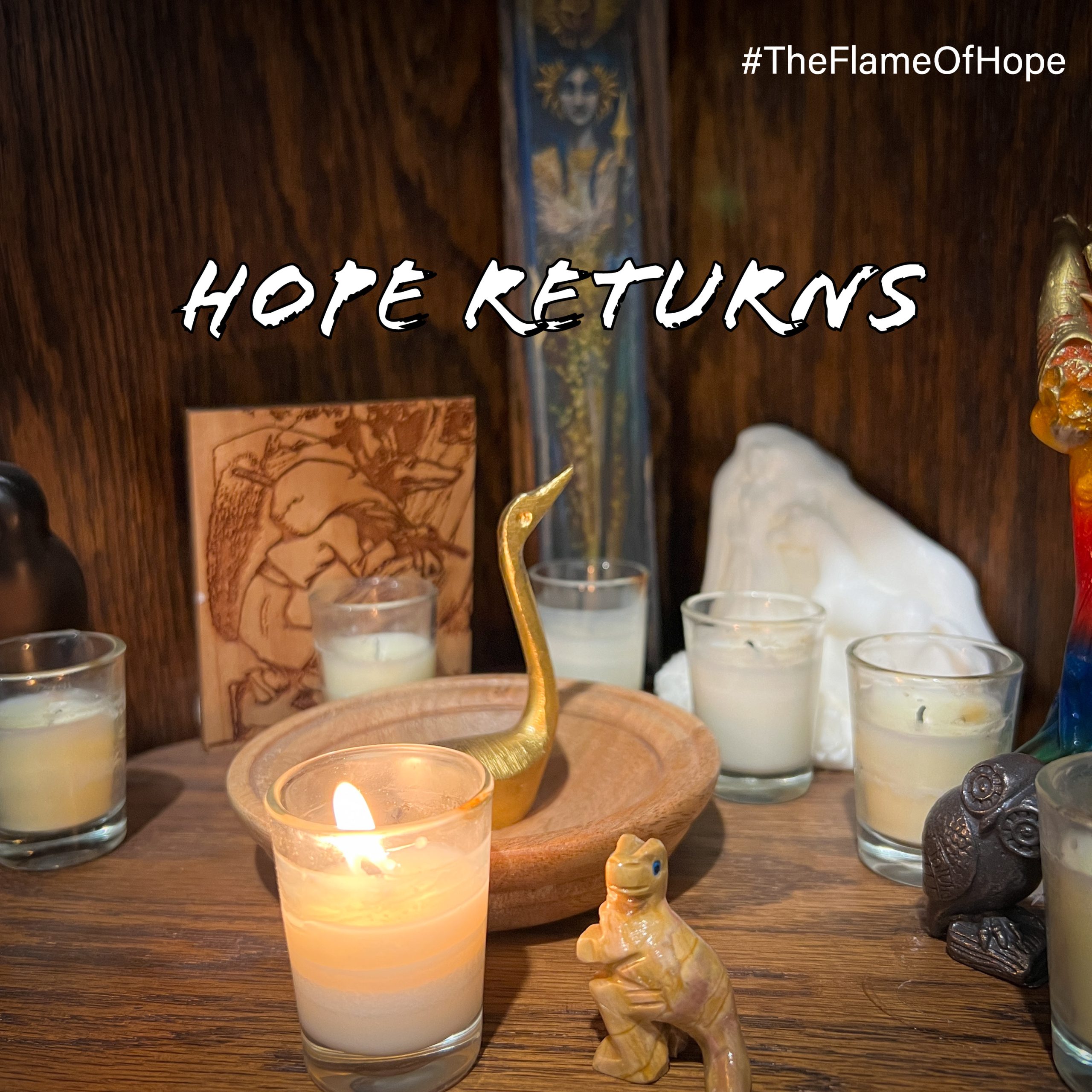 A candle and a small gemstone t-rex on an altar; text: "Hope Returns"