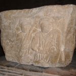 Beardless men with round shields and spears, and round hats