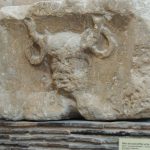 An antlered, bearded head with torcs hanging from the antlers, text "ERNVNNO" at top