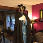 MJD in Night Vale's described costume for an election official: plague doctor mask, an off-brand Snuggie, and stilts