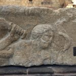 A bearded man with club or torch strikes a snake or holds a bow, viewed straight on