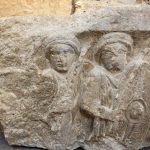 Beardless men with round shields and spears, and round hats