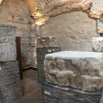 Venus face, lower right, among the other stones in the pillar