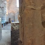 A portion of the Jupiter pillar is visible among the stones