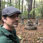 MJD selfie with the Brushwood Nemeton, including god and goddess statues and altar, in background