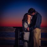 Sunset behind MJD and wife, kissing