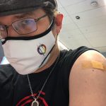 MJD with double mask and bandaid on left arm