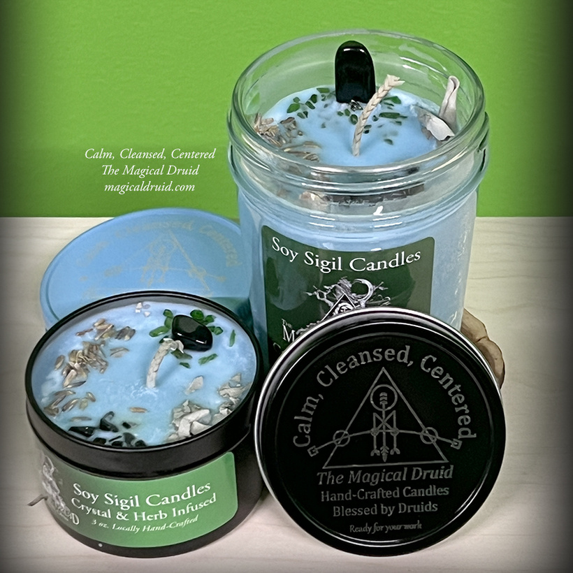 Two candles with a "Calm, Cleansed, Centered" sigil on the top